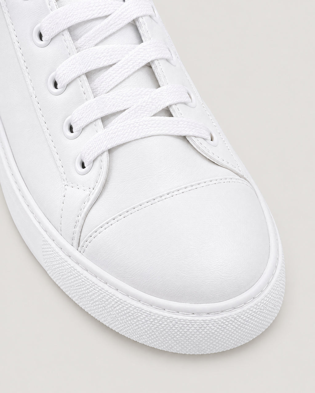 Slip-on Sneaker Damen Weiß – Detail Schnürung