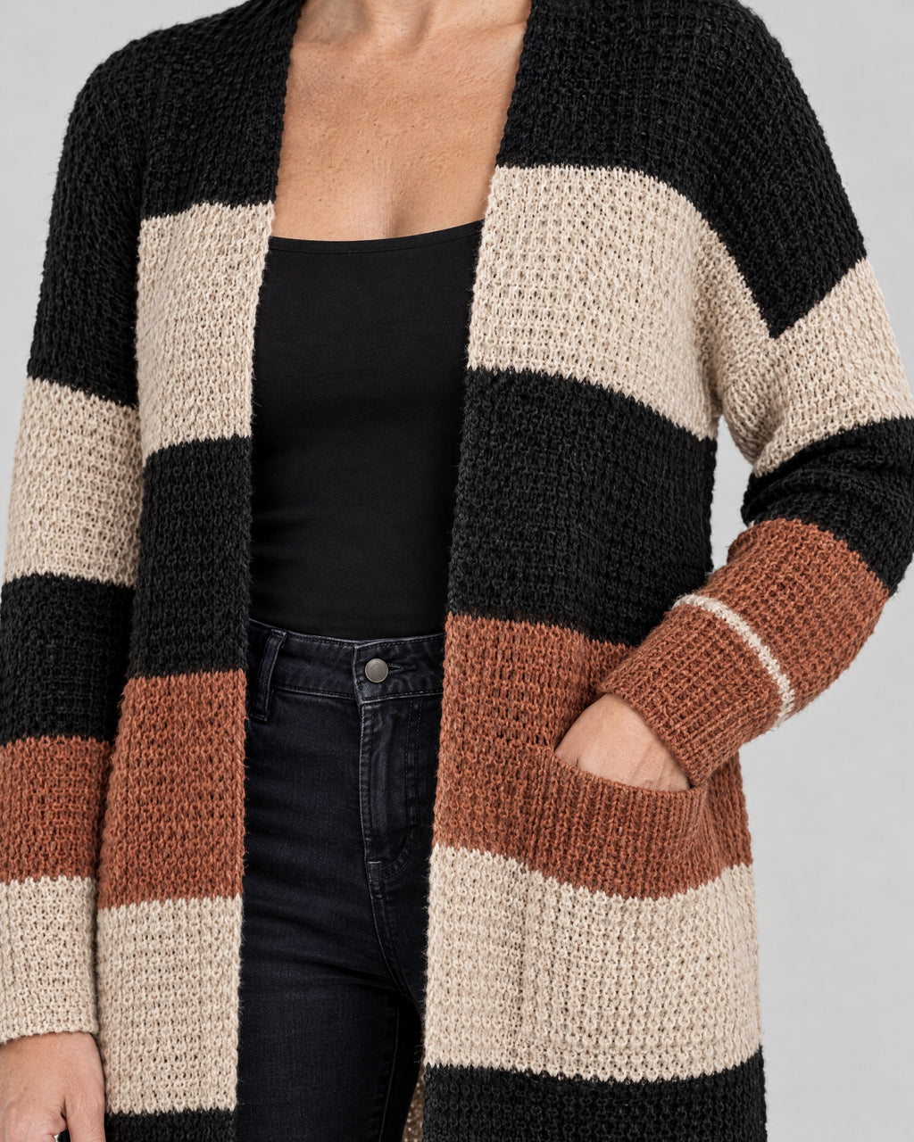 Cardigan – Detail Strick und Taschen