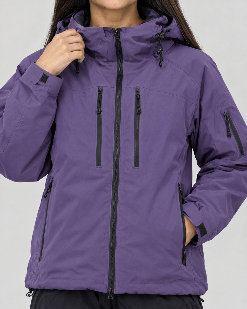 Skijacke – Detail Taschen und Kapuze