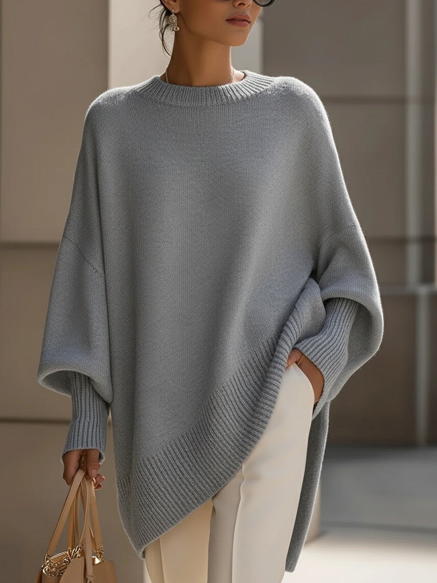 Strickponcho Grau